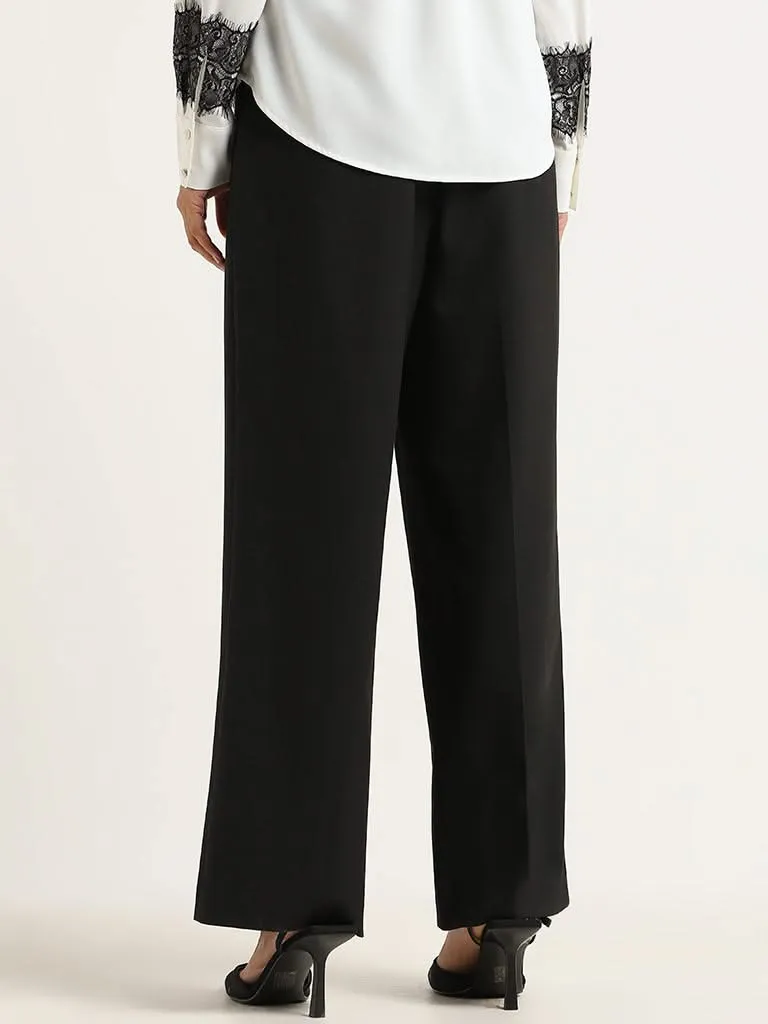 Wardrobe Black Self-Patterned Trousers